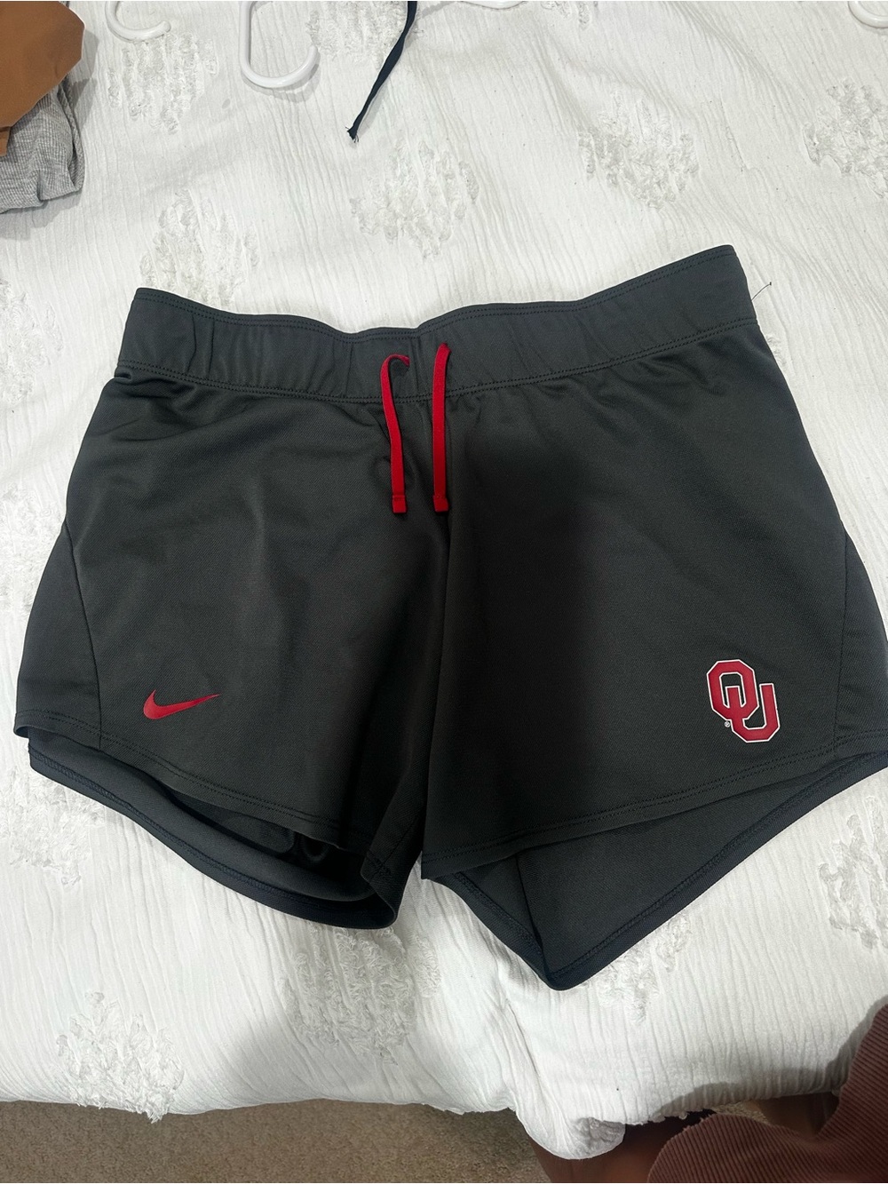 Nike Black Women's Athletic Shorts with Red Accents